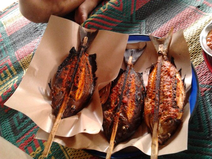 Grilled fish wafting at Nipah Beach