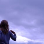 weather in Lombok a girl look into the sky